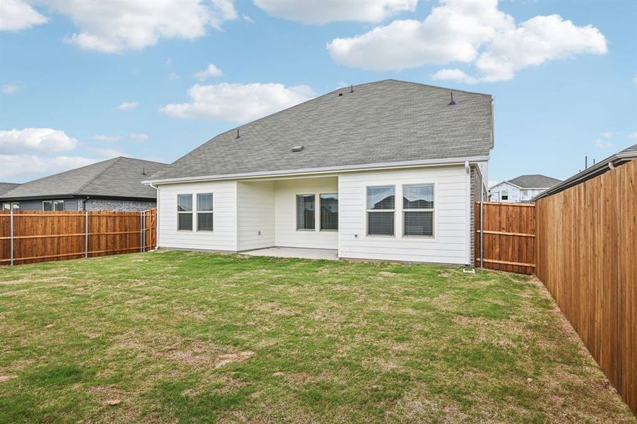 Exterior details and patio area of a home in River Ridge, Crandall (Image 23).