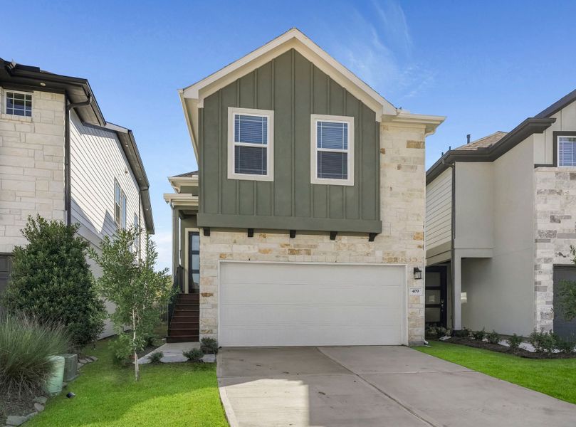 Front exterior of a new home in Park Hill Villas, Stafford, TX, highlighting curb appeal (Image 1). Front exterior of a new home in Park Hill Villas, Stafford, TX, highlighting curb appeal (Image 1).