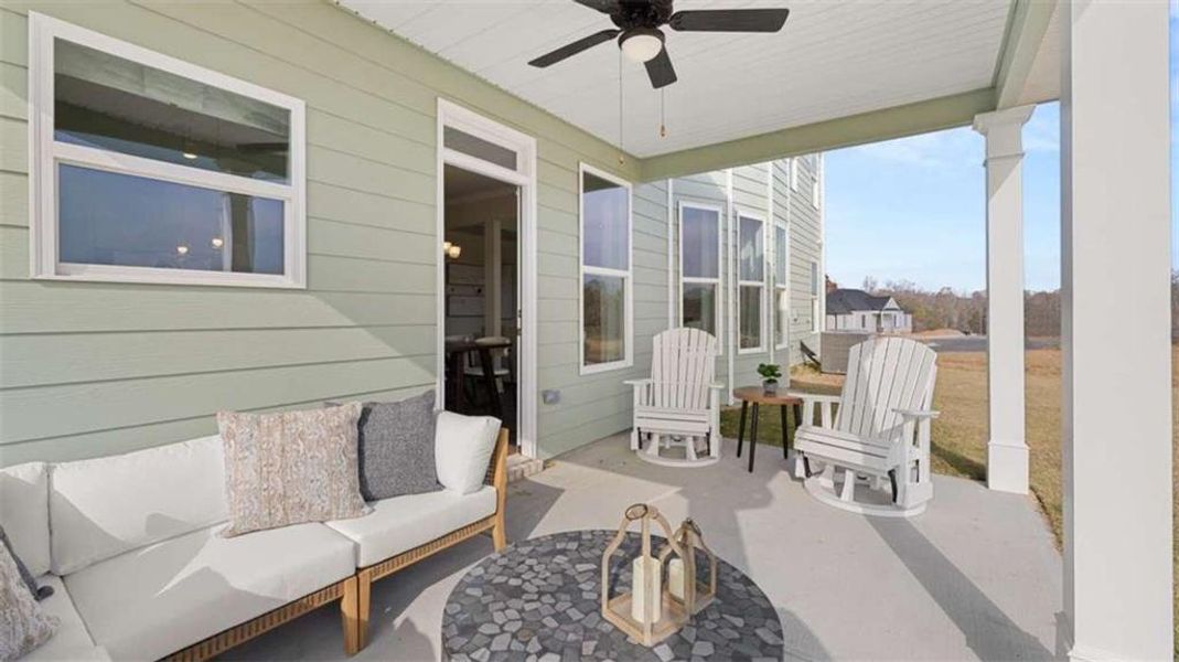 Exterior details and patio area of a home in Evergreen Crossing, Locust Grove (Image 2).