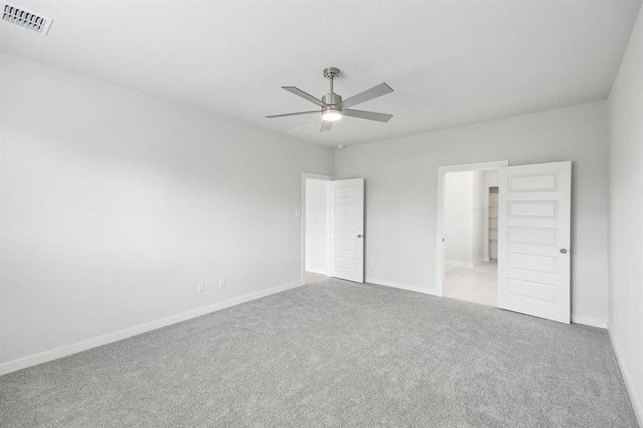 Primary Suite in the Winters home plan by Trophy Signature Homes – REPRESENTATIVE PHOTO