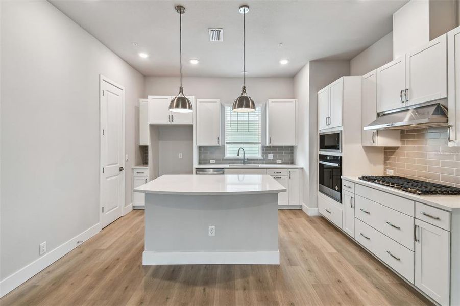 Furnished interior view inside a new home in Towns at Union, St. Petersburg (Image 16).