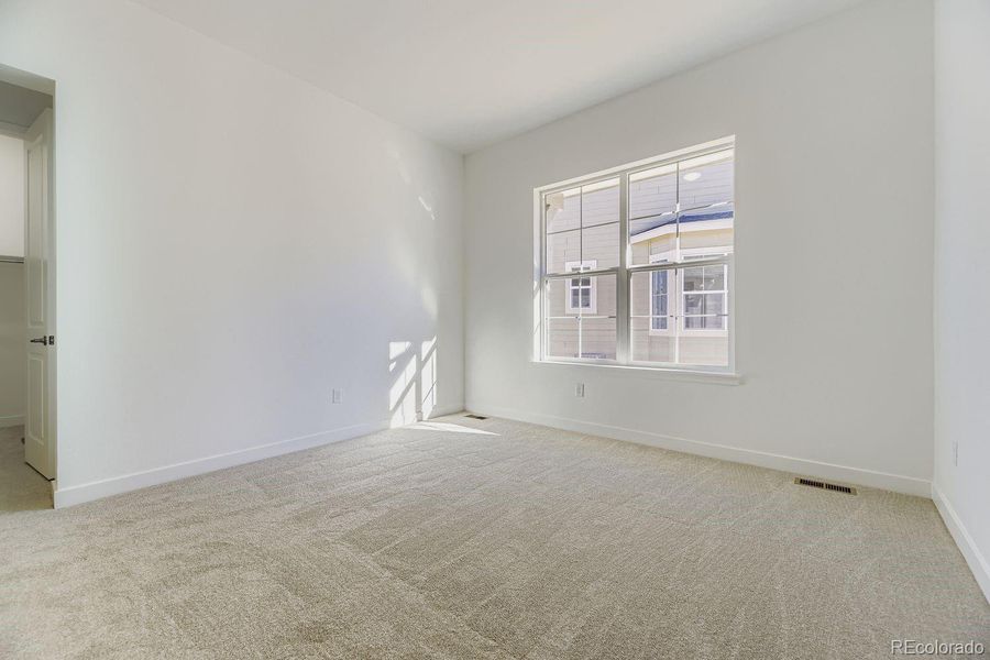 Spacious, unfurnished interior of a new home in Macanta: The Legends Collection, Castle Rock (Image 9).