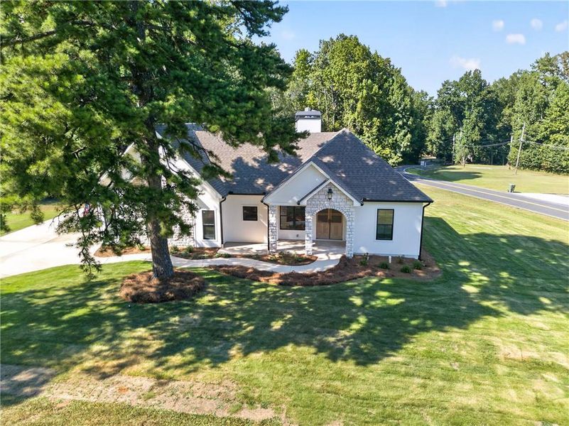 Front exterior of a new home in , Dallas, GA, highlighting curb appeal (Image 26). Front exterior of a new home in , Dallas, GA, highlighting curb appeal (Image 26).