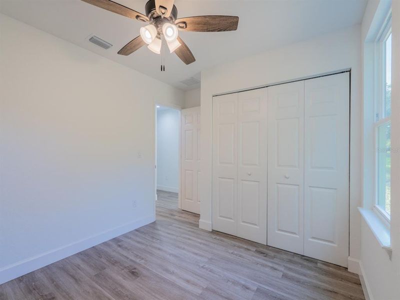 Spacious, unfurnished interior of a new home in , Fort McCoy (Image 10).