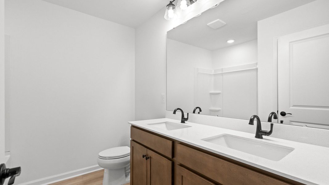Furnished interior view inside a new home in Indigo at the Preserve, Longs (Image 19).