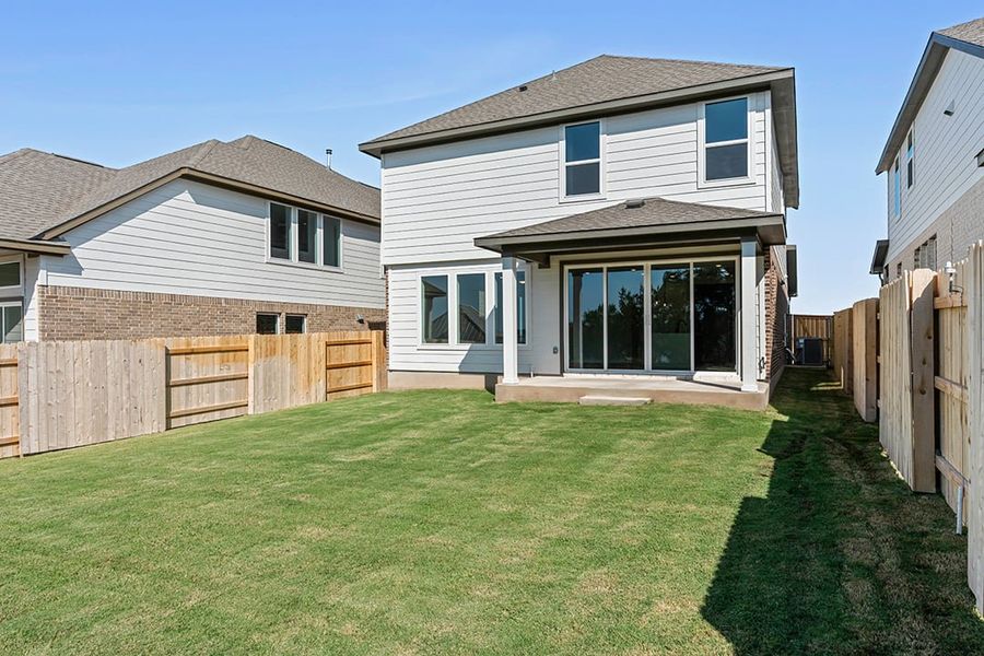 Exterior details and patio area of a home in Terrace Collection at Lariat, Liberty Hill (Image 25). Exterior details and patio area of a home in Terrace Collection at Lariat, Liberty Hill (Image 25).
