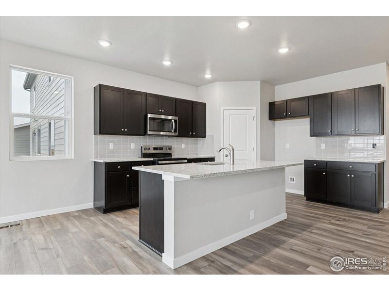 Furnished interior view inside a new home in The Overlook at Johnstown Farms, Johnstown (Image 9).