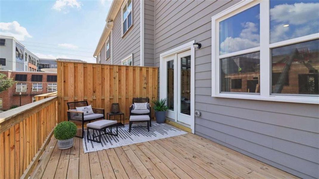 Exterior details and patio area of a home in Townes at Asbury, Hapeville (Image 23).