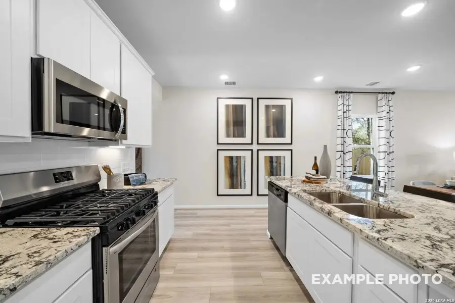 Furnished interior view inside a new home in Agave, San Antonio (Image 19).