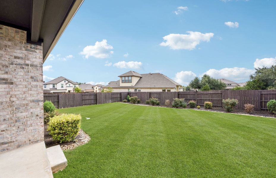 Exterior details and patio area of a home in Crescent Bluff, Georgetown (Image 4).
