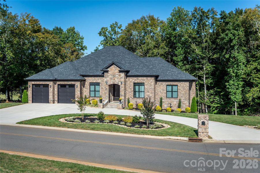 Front exterior of a new home in , Hickory, NC, highlighting curb appeal (Image 26).