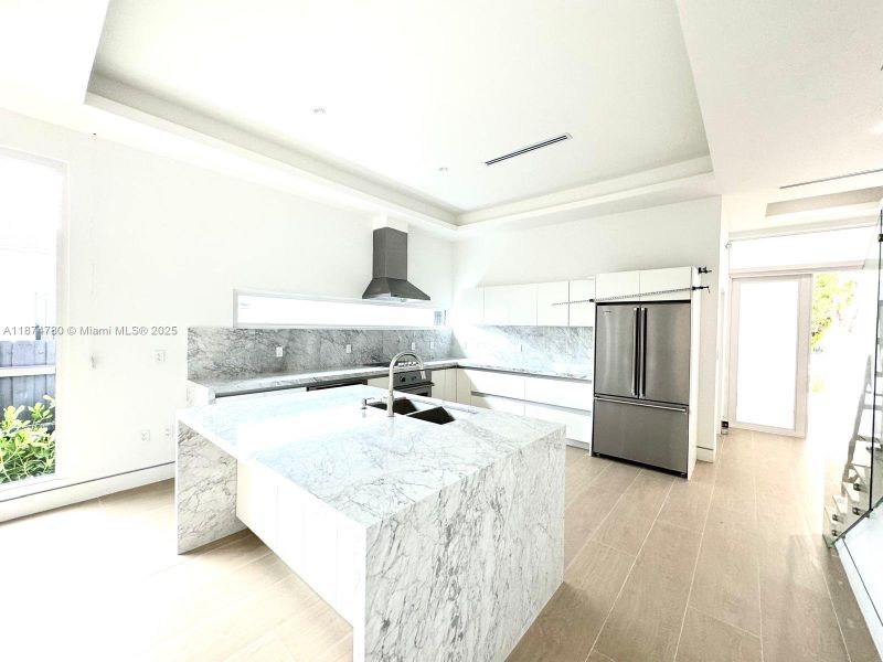 Furnished interior view inside a new home in , Miami (Image 16).