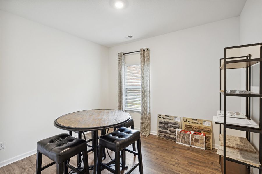 Representative furnished interior of a home built from the Hayden by D.R. Horton in Hillcrest Landing, McDonald (Image 13).