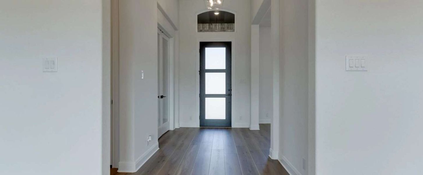 Representative unfurnished interior of a home built from the Kylie by Ashton Woods in Waldsanger, New Braunfels (Image 12).