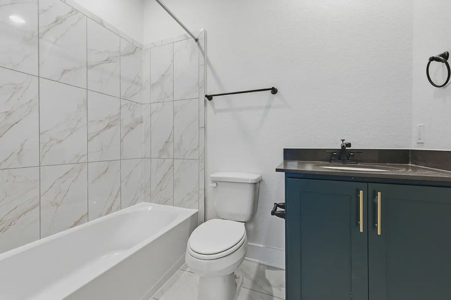 Furnished interior view inside a new home in Centero at Stone Oak, San Antonio (Image 10).