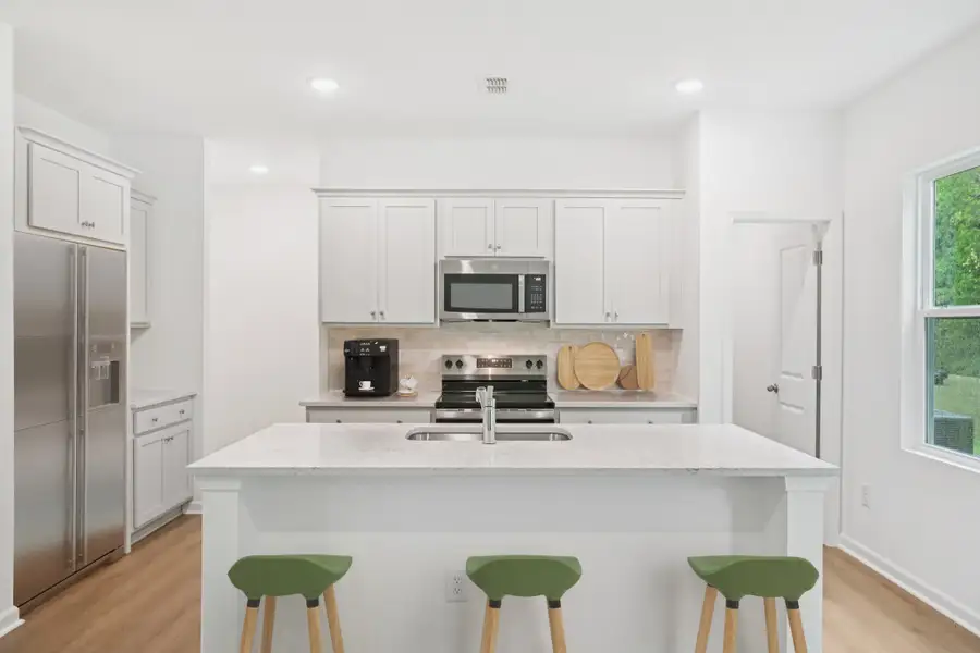 Representative furnished interior of a home built from the Brooke by Ashton Woods in Middleton Farms, Middlesex (Image 5).
