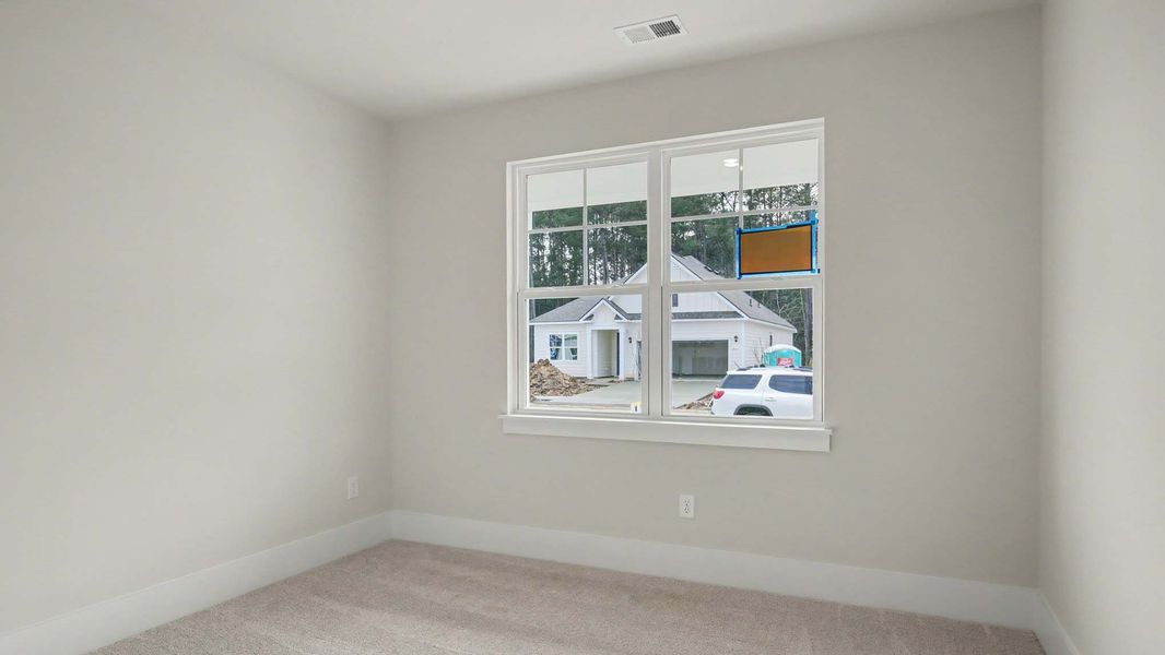 Representative unfurnished interior of a home built from the Calvert by D.R. Horton in Chapman Village, Conway (Image 12).