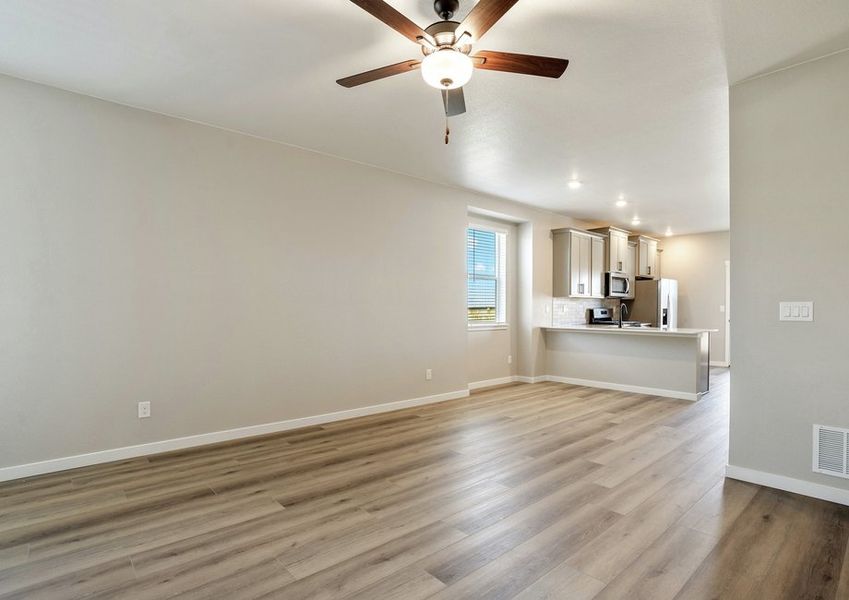 The open layout has the dining and family room open to the kitchen.