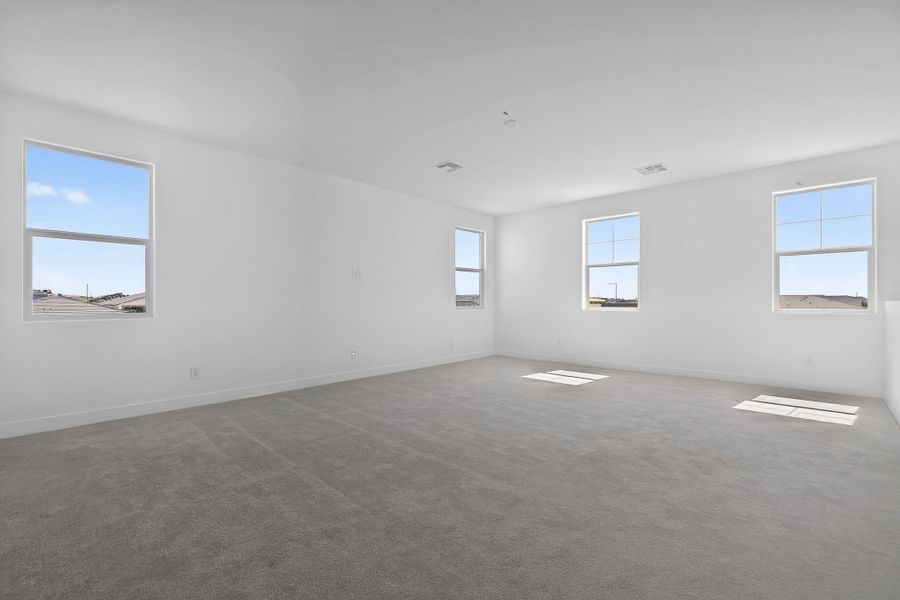Spacious, unfurnished interior of a new home in The Grove at El Cidro, Goodyear (Image 28).