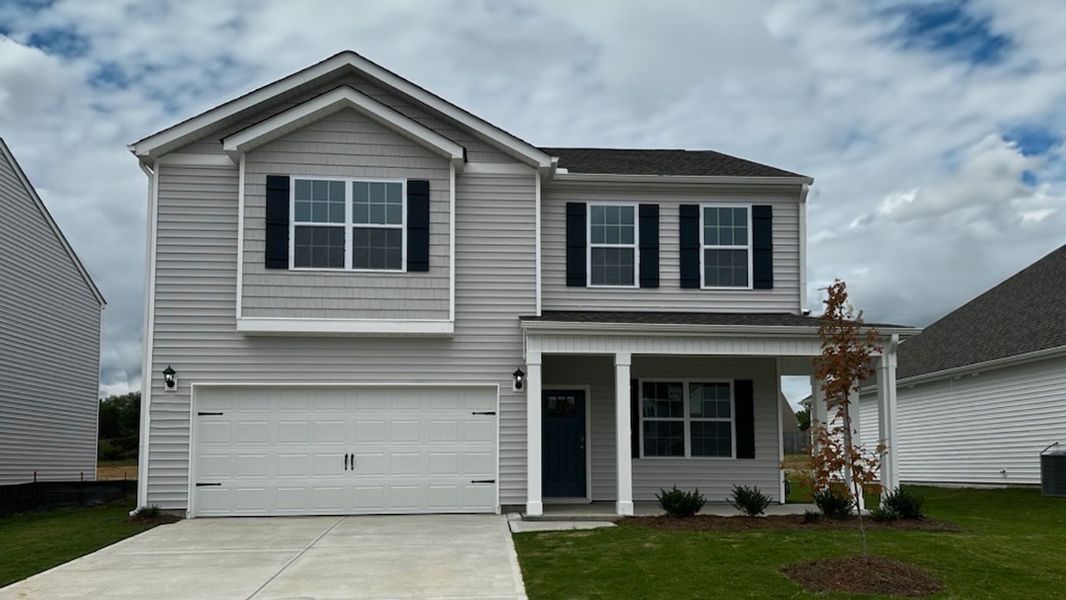 Representative exterior photo of a completed home built from the PENWELL by D.R. Horton in Bedford Place, Wilson, NC (Image 2).