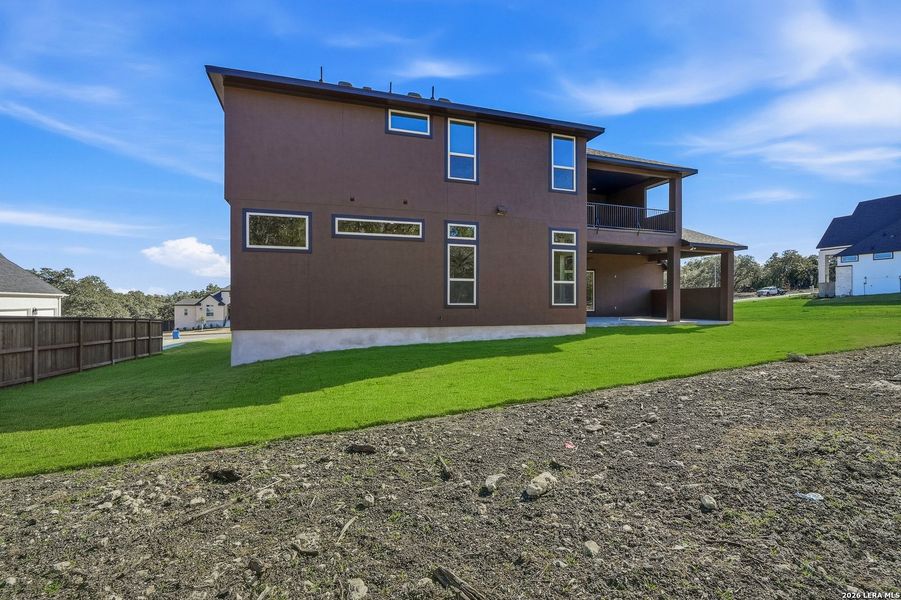 Exterior details and patio area of a home in Heimer Estates at Garden Ridge, San Antonio (Image 28).