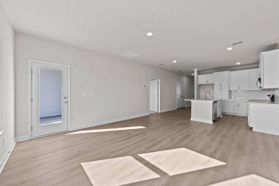 Spacious, unfurnished interior of a new home in Blue Heron Retreat: Villas, Little River (Image 16).