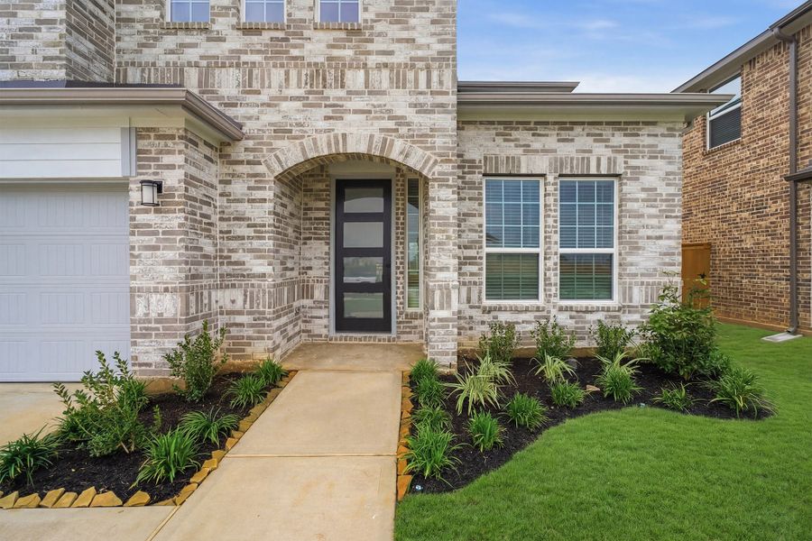 Exterior details and patio area of a home in Sunterra Lakes, Brookshire (Image 3). Exterior details and patio area of a home in Sunterra Lakes, Brookshire (Image 3).