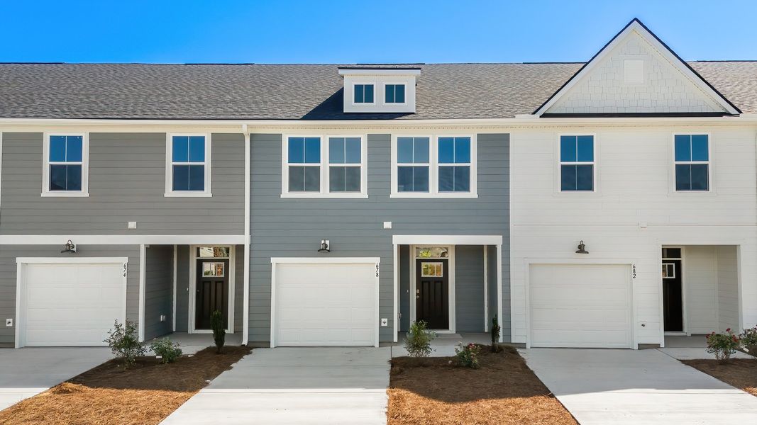 Furnished interior view inside a new home in Townes at Carolina Forest, Myrtle Beach (Image 1). Furnished interior view inside a new home in Townes at Carolina Forest, Myrtle Beach (Image 1).