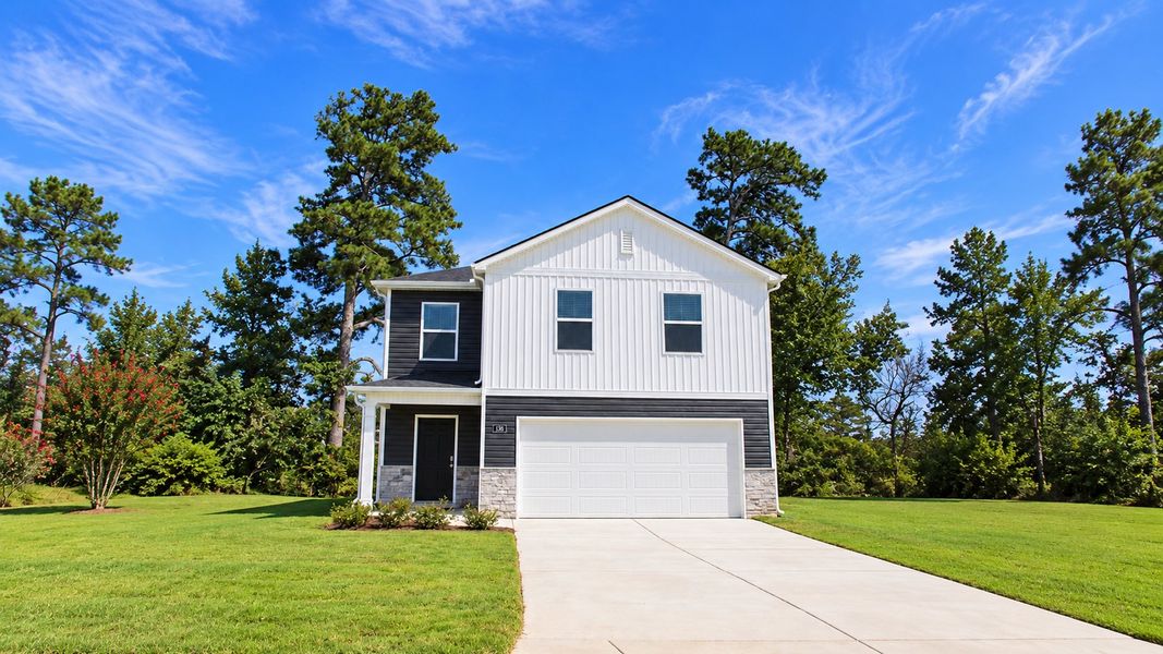 Front exterior of a new home in Evergreen Landing, Rossville, GA, highlighting curb appeal (Image 21). Front exterior of a new home in Evergreen Landing, Rossville, GA, highlighting curb appeal (Image 21).