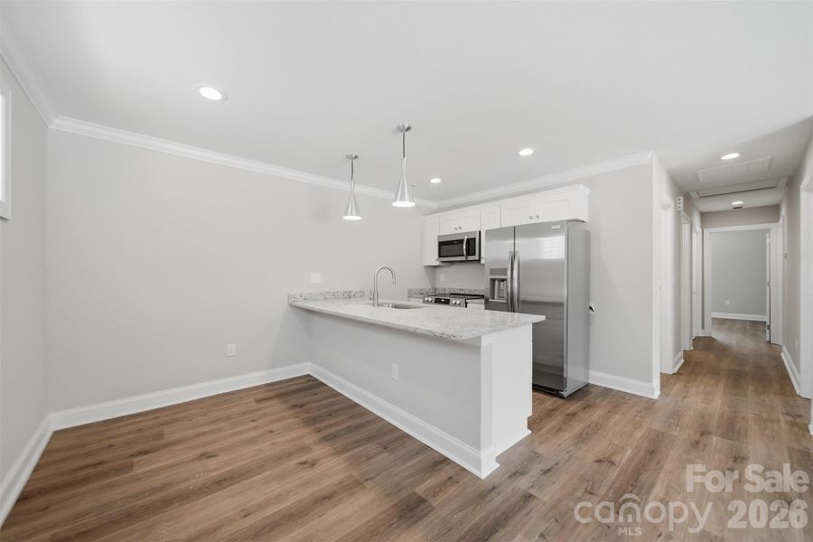 Furnished interior view inside a new home in , Hickory (Image 6).