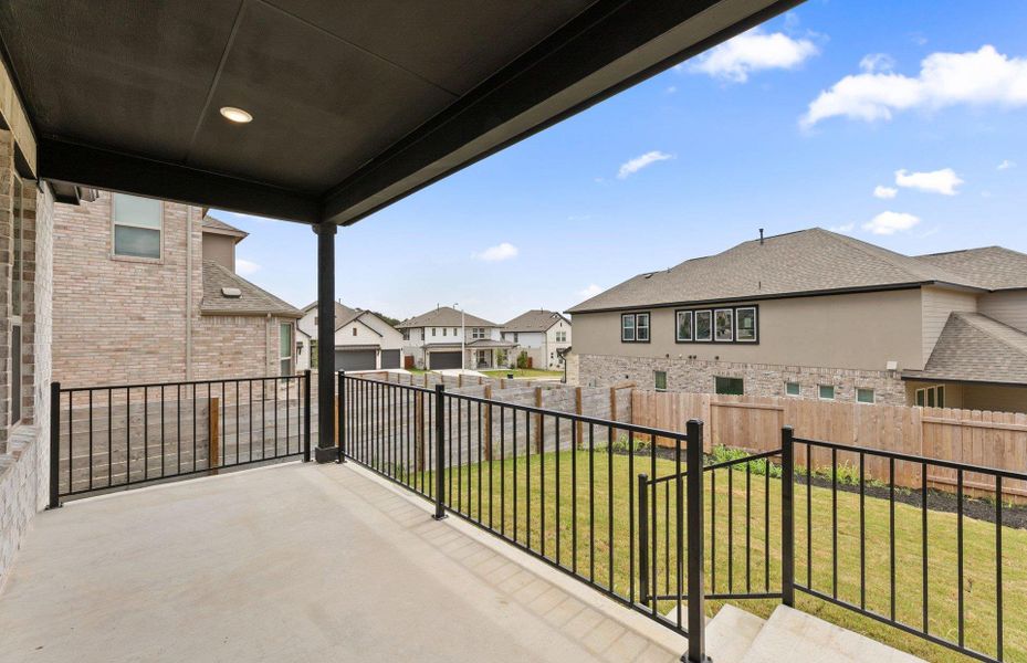 Exterior details and patio area of a home in Bluffview Reserve, Leander (Image 26).