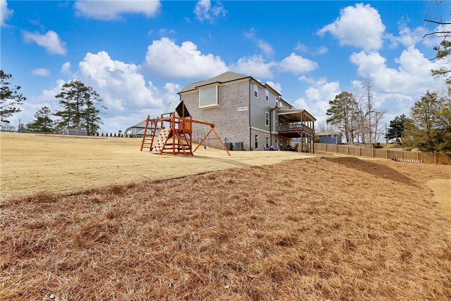 Exterior details and patio area of a home in , Buford (Image 27). Exterior details and patio area of a home in , Buford (Image 27).