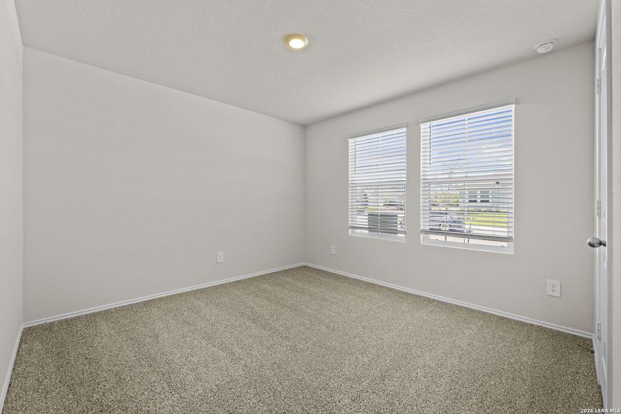 Spacious, unfurnished interior of a new home in Swenson Heights, Seguin (Image 21).