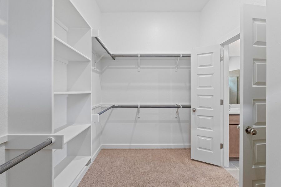 Primary Closet in the Quartz home plan by Trophy Signature Homes – REPRESENTATIVE PHOTO
