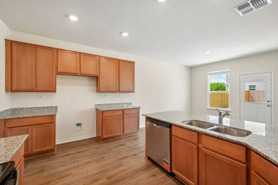 Furnished interior view inside a new home in Preserve at Culebra - Sterling Collection, San Antonio (Image 11).