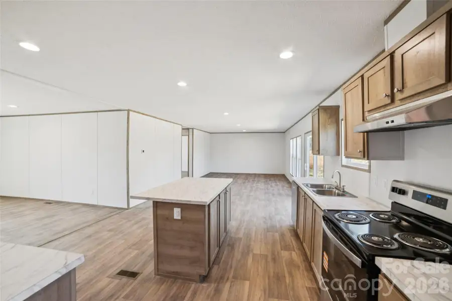 Furnished interior view inside a new home in , Vale (Image 8).