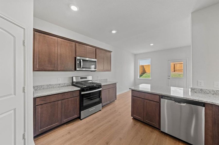 Furnished interior view inside a new home in Big Sky Estates, Ponder (Image 4).