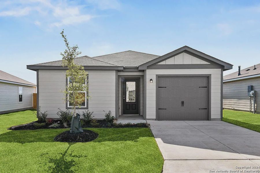 Front exterior of a new home in Savannah Place, San Antonio, TX, highlighting curb appeal (Image 1). Front exterior of a new home in Savannah Place, San Antonio, TX, highlighting curb appeal (Image 1).