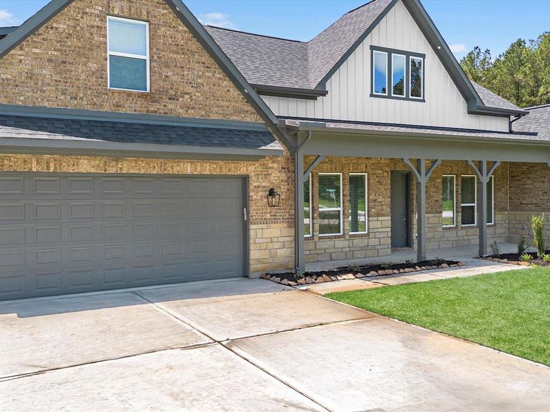 Front exterior of a new home in , Dayton, TX, highlighting curb appeal (Image 2).
