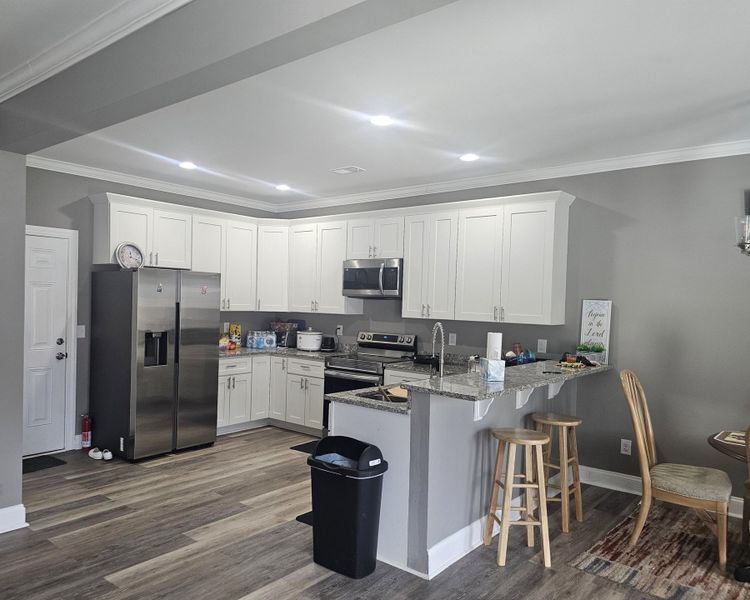 Furnished interior view inside a new home in , St. George (Image 11).