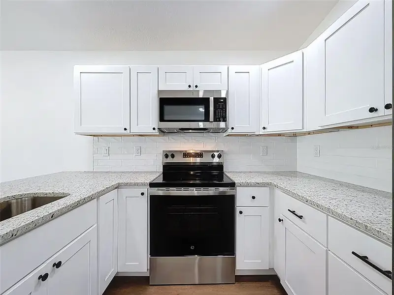 Furnished interior view inside a new home in , Weeki Wachee (Image 8).