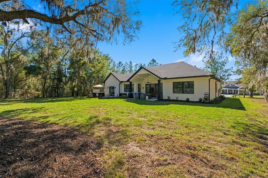 Exterior details and patio area of a home in , Brooksville (Image 32). Exterior details and patio area of a home in , Brooksville (Image 32).