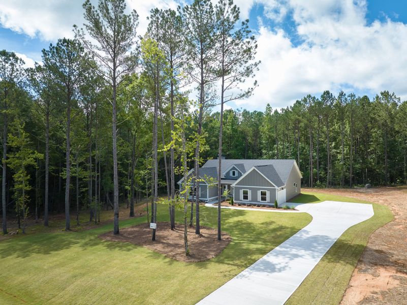 Front exterior of a new home in Flint Farms, Concord, GA, highlighting curb appeal (Image 18).