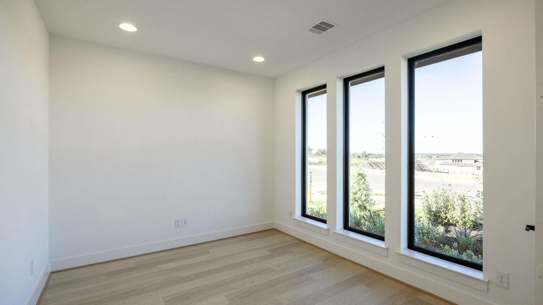 Spacious, unfurnished interior of a new home in Eldorado At Santa Rita Ranch 60', Liberty Hill (Image 10).