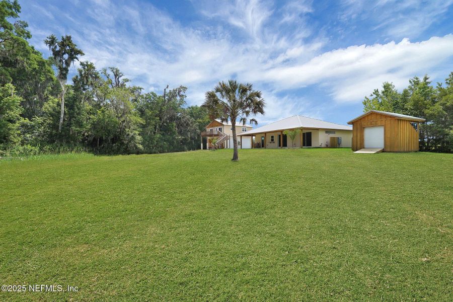 Front exterior of a new home in , East Palatka, FL, highlighting curb appeal (Image 44). Front exterior of a new home in , East Palatka, FL, highlighting curb appeal (Image 44).
