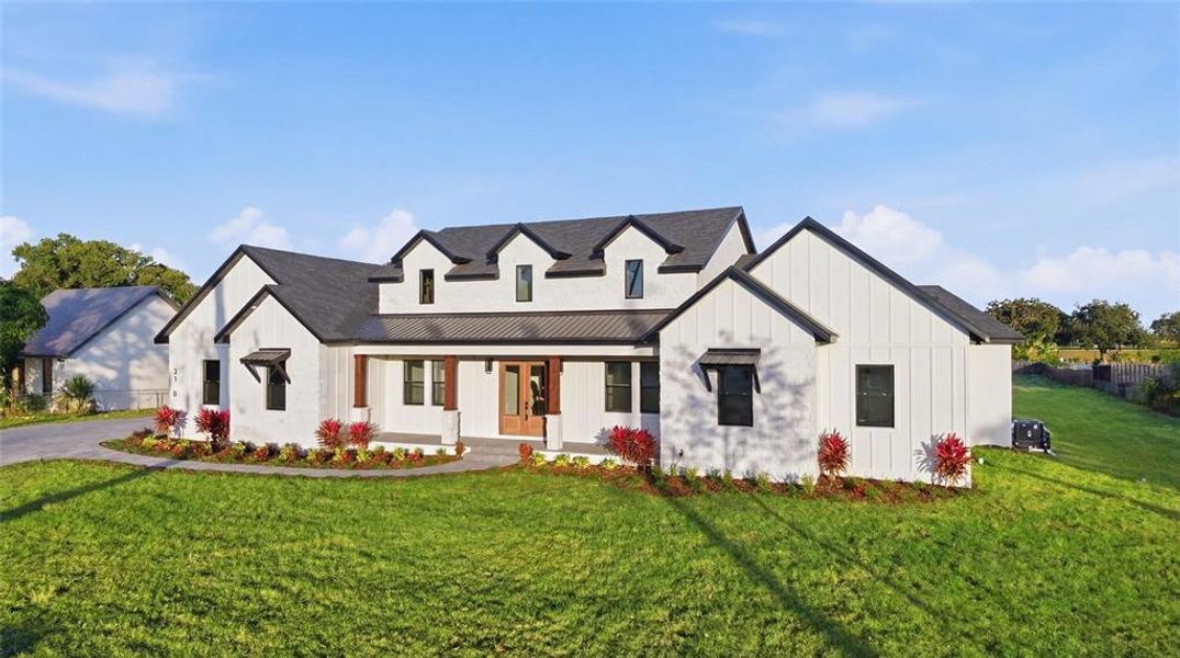 Front exterior of a new home in , Plant City, FL, highlighting curb appeal (Image 33).