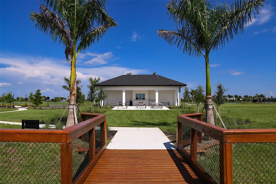 Exterior details and patio area of a home in Cassia at Skye Ranch, Sarasota (Image 21). Exterior details and patio area of a home in Cassia at Skye Ranch, Sarasota (Image 21).