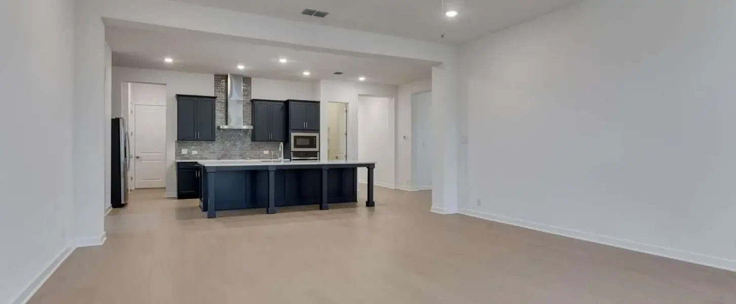Representative furnished interior of a home built from the Blanco by Ashton Woods in Saddlebrook Ranch, Schertz (Image 10).