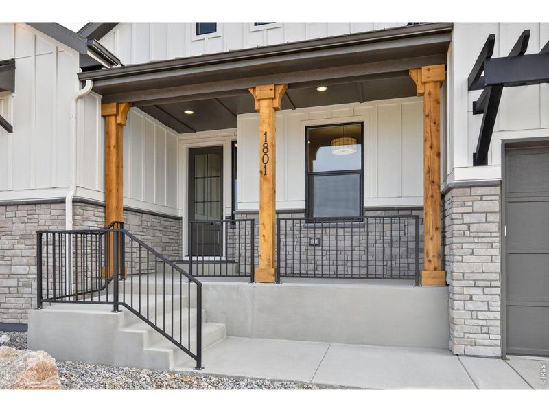 Exterior details and patio area of a home in RainDance, Windsor (Image 25).