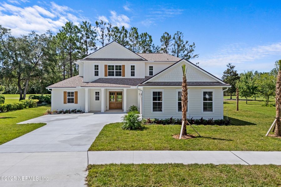 Front exterior of a new home in , Orange Park, FL, highlighting curb appeal (Image 22).